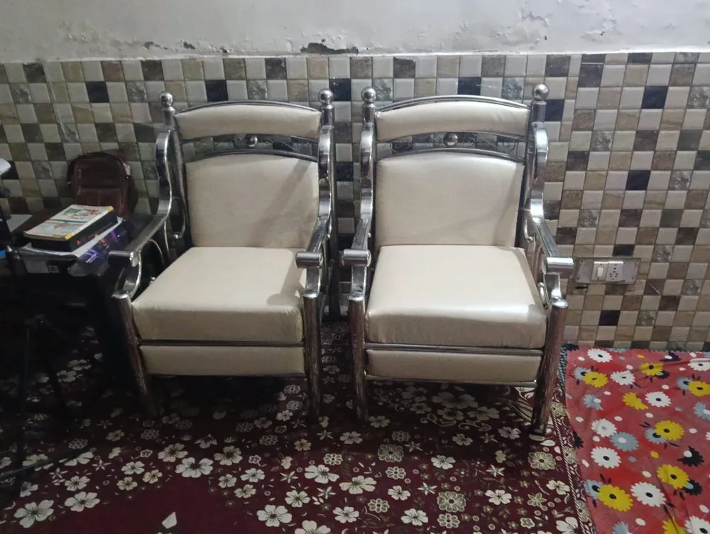 Chair being reupholstered by hand